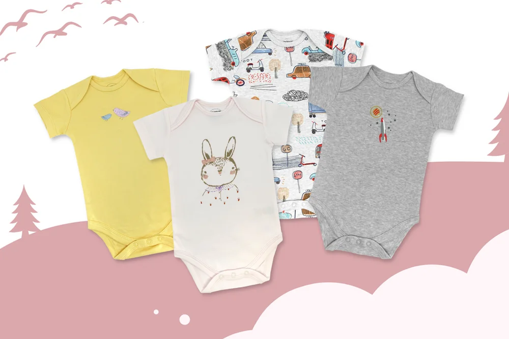 Pastel baby rompers displayed together